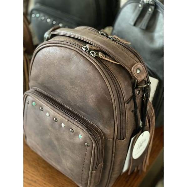 Leather concealed carry store backpack